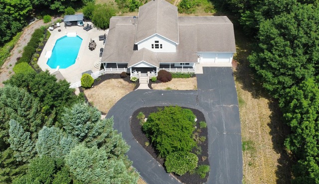 Private heated pool, ATV trails and shooting range on 20 acres