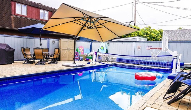 Private heated pool in back & Sandy beach in front