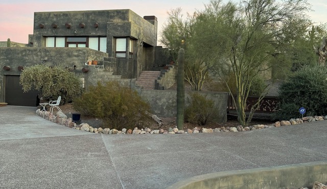 Private home against Superstition Mountains