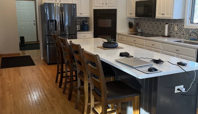 Private home on 3+ acres with lake access to lower South Long lake!