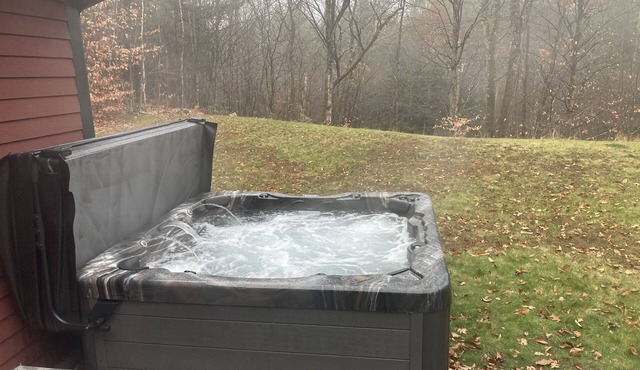 Private hot tub with seasonal pellet smoker