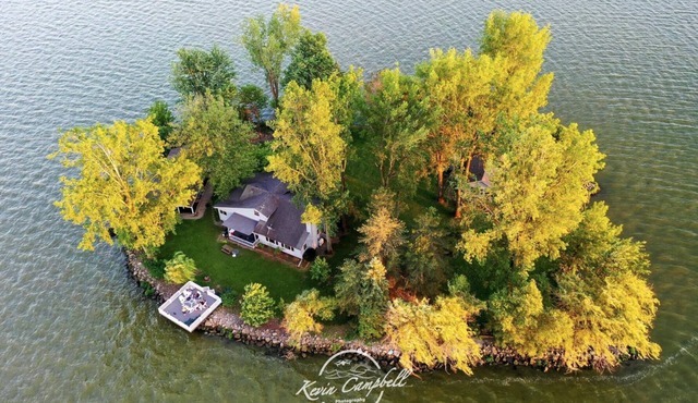Private Island! Includes house, cottage, boat docks, best sunsets on Indian Lake