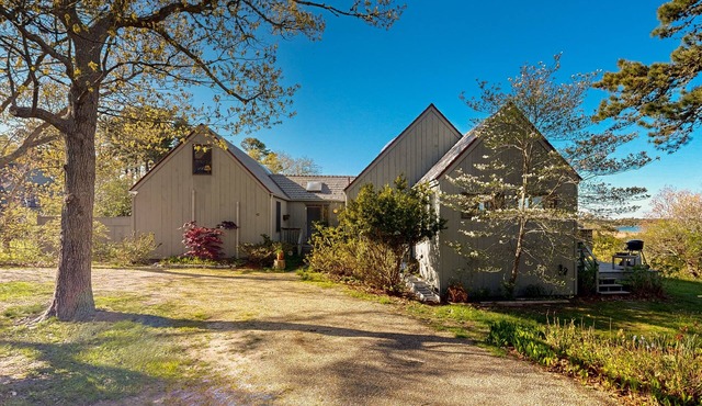 Private island house with close beach access and water view from deck
