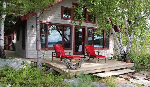 Private Island secluded on pristine Tupper Lake. Boats usage included in. Rental