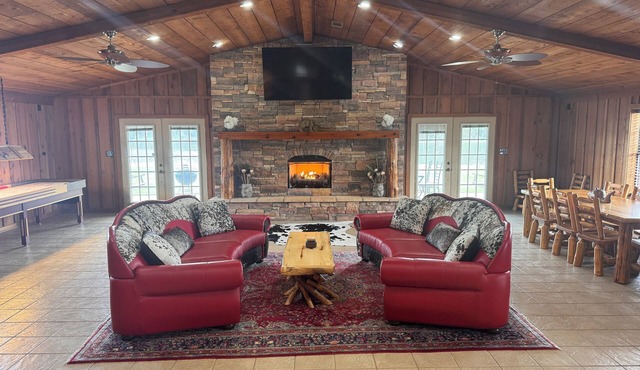 Private Lake Lodge on 104 acres with bar, pool table, shuffle board and more!