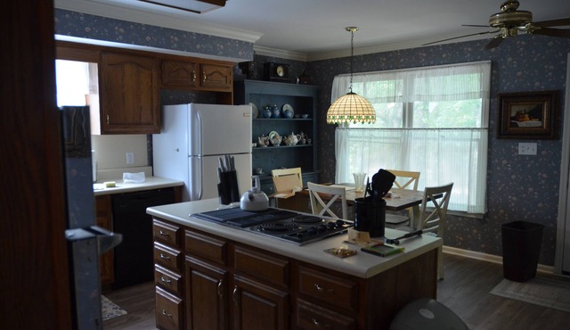 Private lake side house in the Woods.