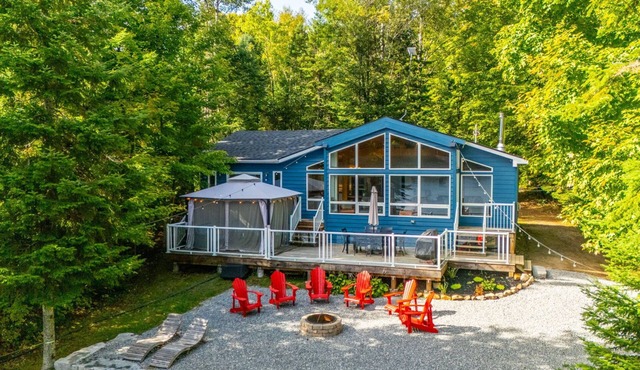 Private lakeside home that blends luxury with laid-back charm year-round!