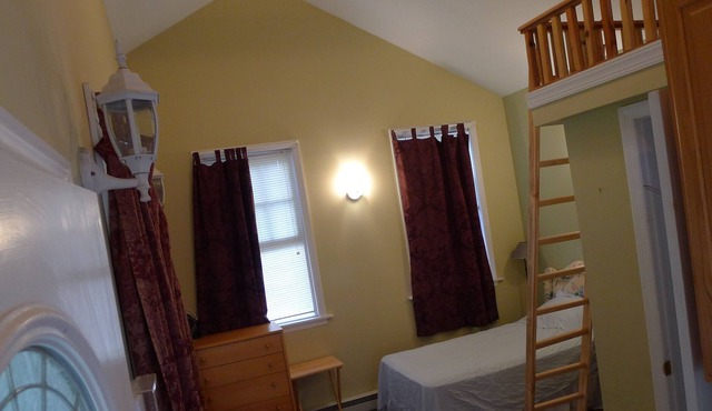private loft bedroom with bath