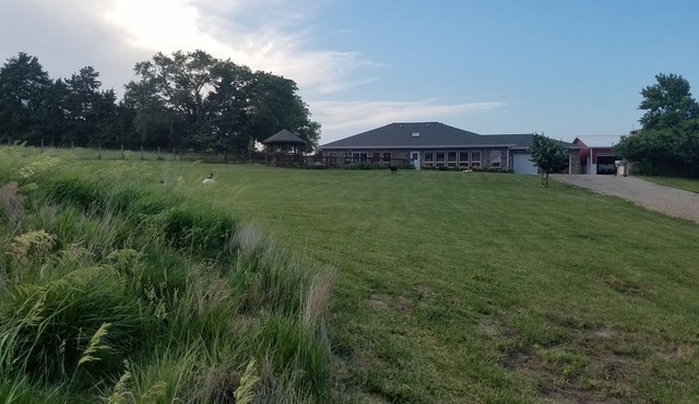 Private loft on charming acreage between Omaha and Lincoln w/animal sanctuary.