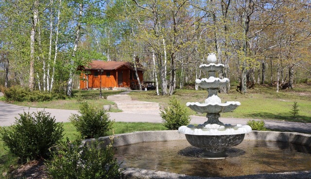 Private log cabin with view overlooking Grand Lake
