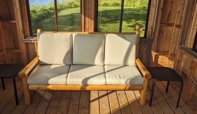 Private multi-family, fully stocked cottage on Graham Lake with large front lawn