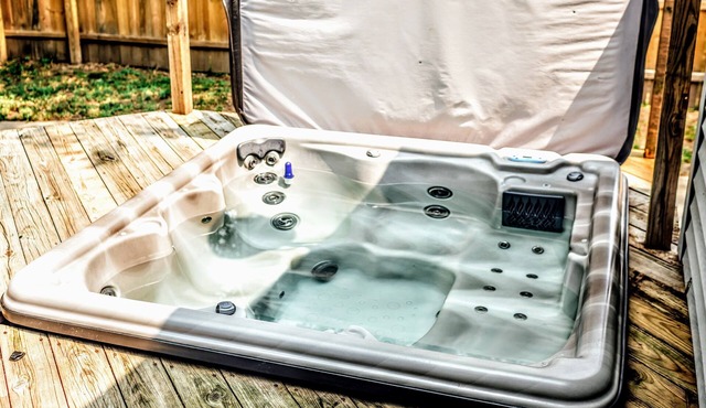 Private oasis huge heated inground pool with hot tub close to Grand Rapids