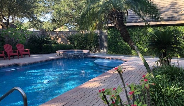 Private Oasis in prime McAllen location with Gated Parking, Pool & Heated HotTub