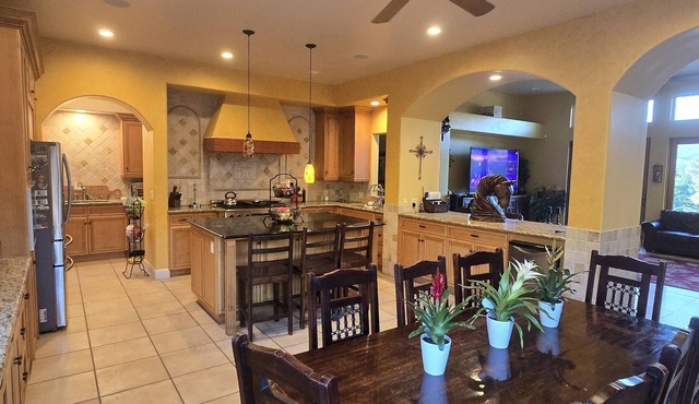 Private oasis with pool, outdoor bar, horses, river access & pyramid.