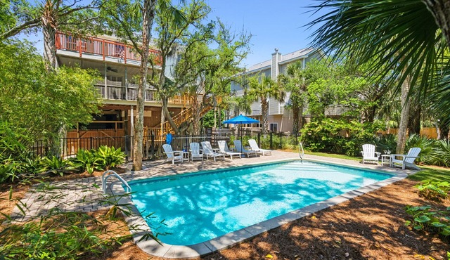 Private Oasis with a Large Saltwater Pool Close to Everything - Screened Porch and Deck Open Concept