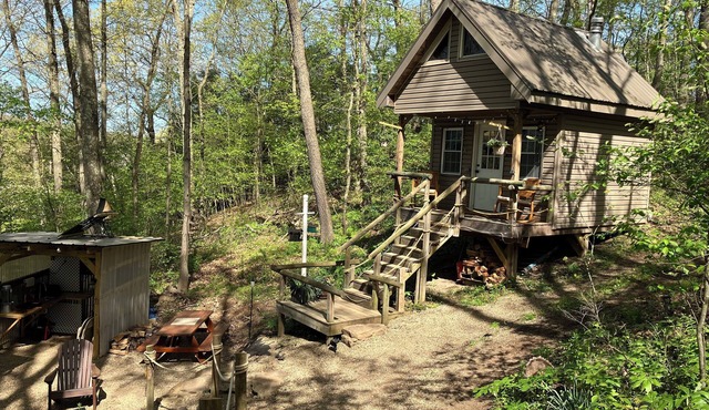 Private off grid cabin nestled on 40 acres at historic Camp Bouquet
