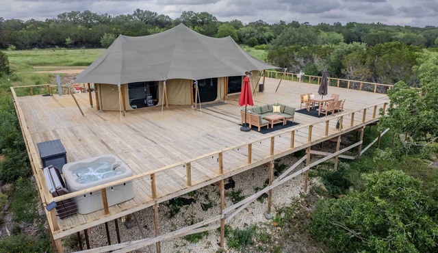 Private Outdoor Hot Tub with Stunning Mountain View Safari Tent Suite Glamping