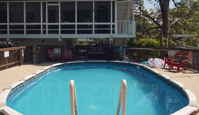 Private pool, boat dock & screened porches - 1.5 blocks to public beach access.