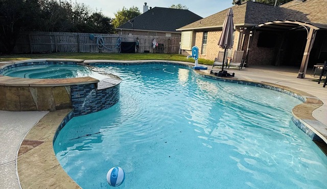 Private Pool + Hot Tub! 4BR Retreat with Ultimate Tailgate Patio