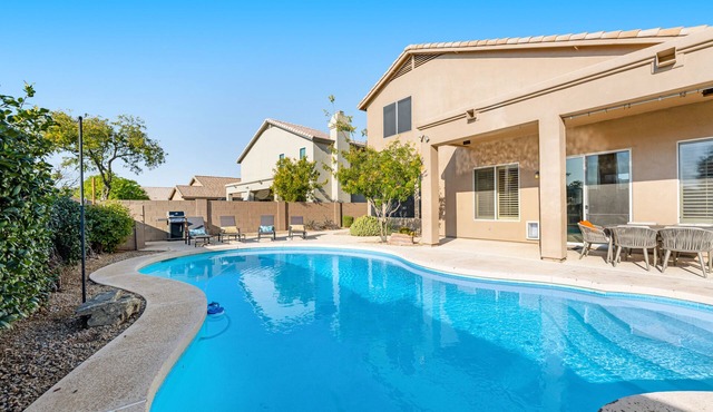 Private pool home with walled yard, firepit, grill & lanai - dog-friendly