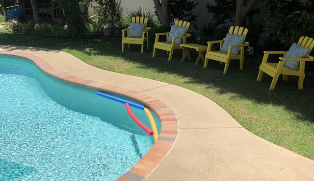 Private property beautifully landscaped and pool with a 2 bed 1 ba unit