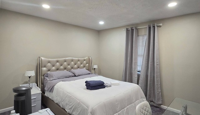 Private Queen Room with Ensuite Bath & 65” Smart TV – Stone Mountain