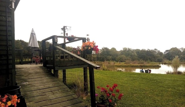 Private, quiet en-suite hut, glorious views to South Downs, wild swimming.