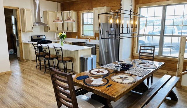 Private Ranch with well-appointed 4 bed/4 bath log cabin!