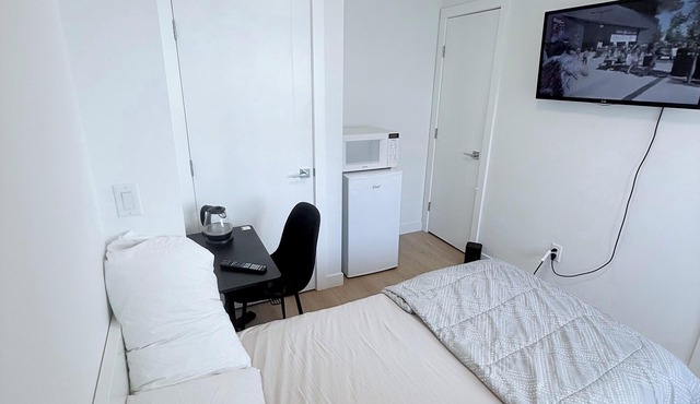 Private Room with Separate Entrance & Bath Near Calgary Airport with Parking"