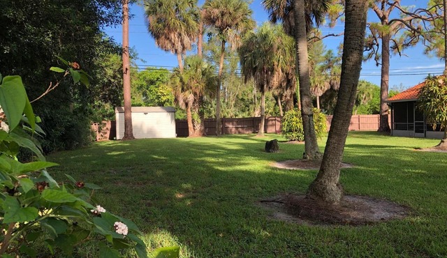 Private Sanctuary in the Heart of Royal Palm Beach..