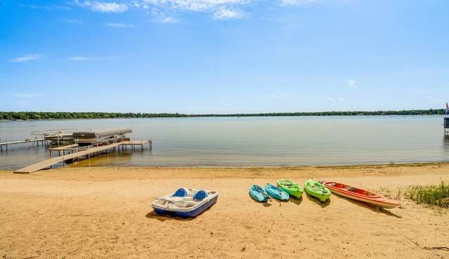 Private sandy swimming beach on White Sand Lake