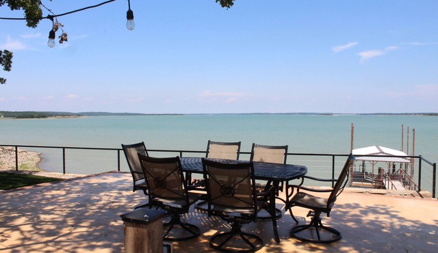 PRIVATE, SECLUDED LAKEFRONT RETREAT WITH BOAT DOCK, LARGE PATIOS AND HOT TUB!