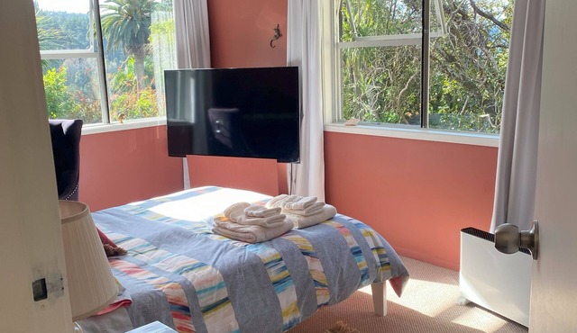 Private studio with your own waterfall garden and 5 minute walk to Hospital