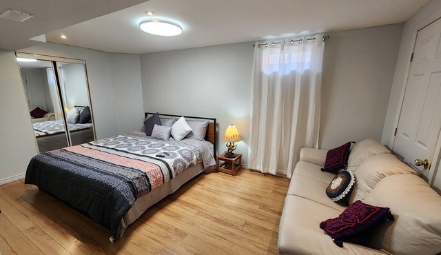 Private walkout large bedroom bsmnt Apt living, dining&kitchen and free parking