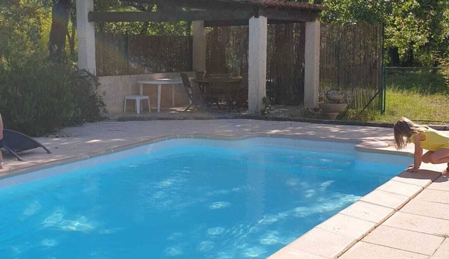 Provencal country house surrounded by greenery with private pool
