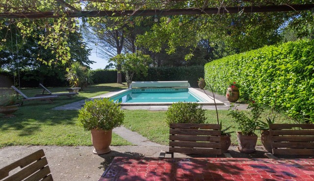 Provencal farmhouse in the countryside. Wooded and enclosed park with swimming pool, not overlooked.