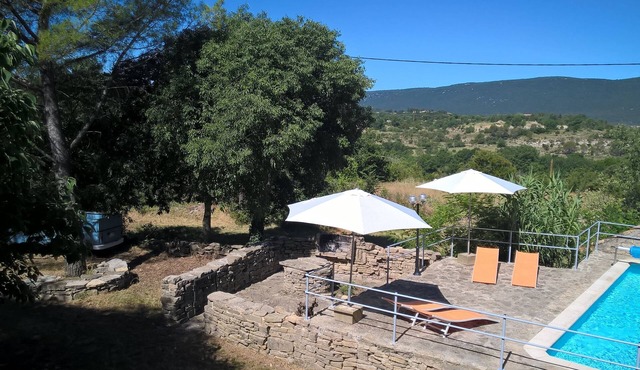 Provencal farmhouse with swimming pool in a domain of 4 ha in the middle of the village