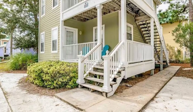 Purple Parrot Paradise – Perfect Family Condo Near Beaches & Attractions