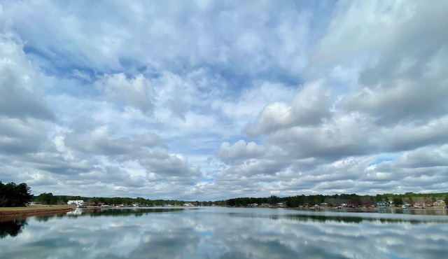 Put your feet up, relax and unwind on the screened porch or go jump in the lake!