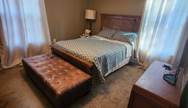 Quaint 2-bedroom house with balcony that serves as another bedroon.