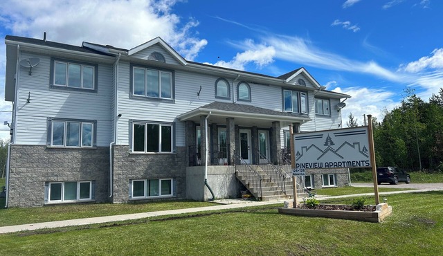 Quaint 3 bedroom apartment with full bathroom, full kitchen and in-unit laundry