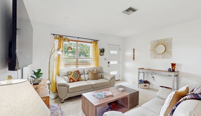 Quaint bungalow with unique swim spa w/hot tub, outdoor shower & enclosed yard