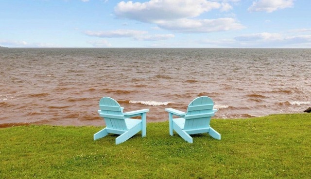 Quaint Cottage with direct beach access and water views that go on for miles.