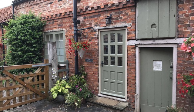 Quaint cottage with all modern conveniences in quiet village location