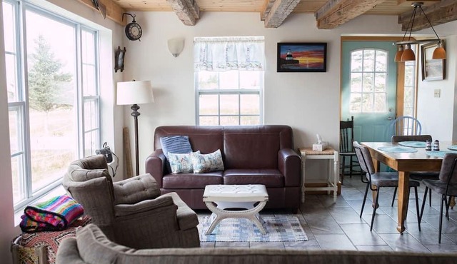 Quaint house with large deck close to lighthouse on the Bay of Fundy.