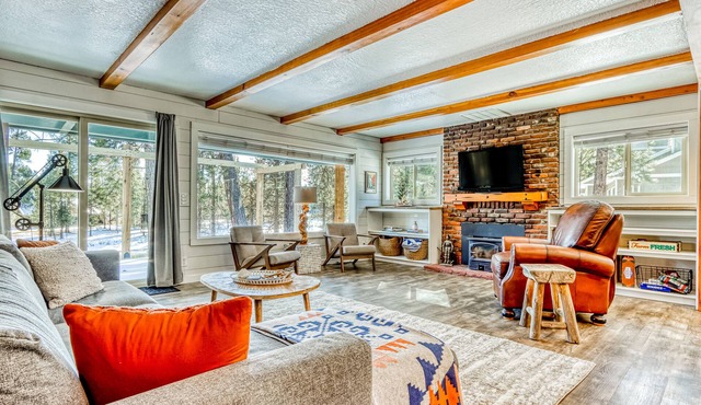 Quaint, riverfront home with woodstove, patio, deck, board games & washer/dryer