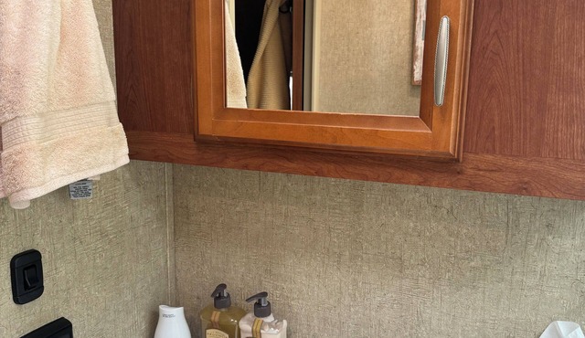 Quaint RV with AC in charming Pineville-nA Primitive and Off Grid Campsite