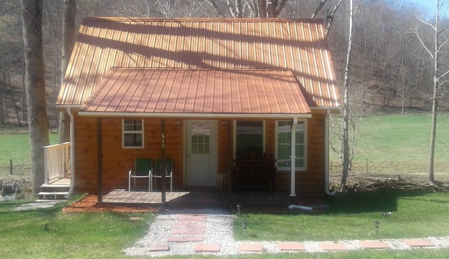 Quaint, secluded cabin with the feel of home. Sleeps 4 with home-like amenities.