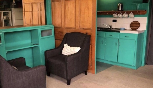 Quaint, self contained apartment with kitchenette.