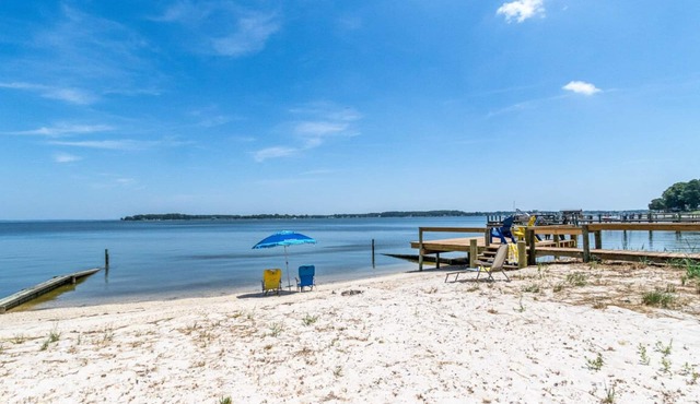 Quaint waterfront home with private beach